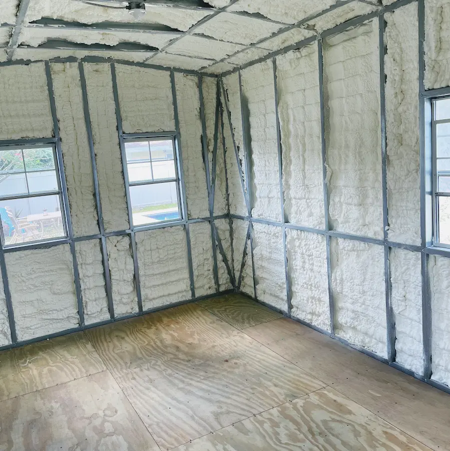 Closed-cell spray foam insulation applied to wall cavities in a residential project in Halifax